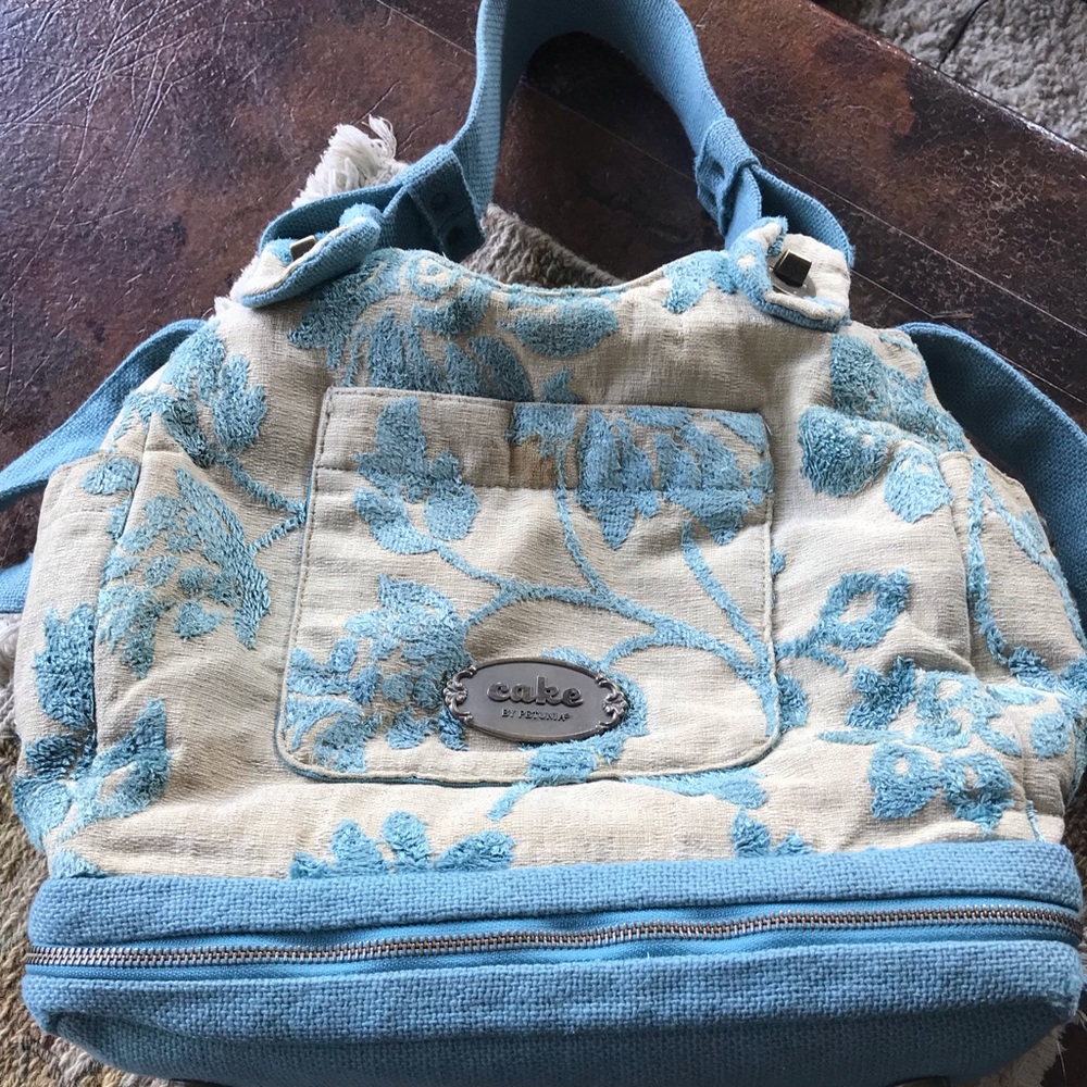 Cake petunia pickle bottom satchel new over $300